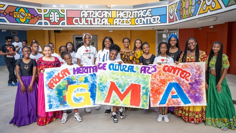 Students and instructors gathered in the courtyard of the Marshall L. Davis, Sr. African Heritage Cultural Arts Center.